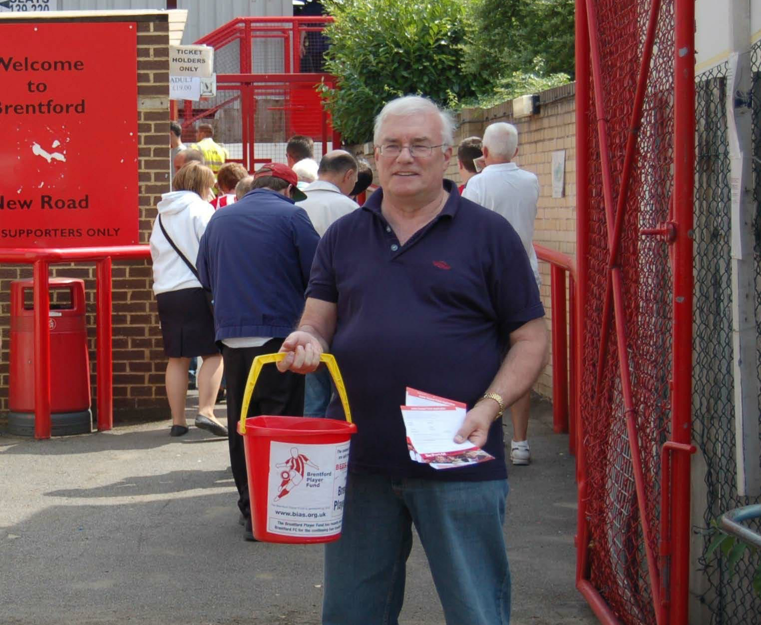 BU Director John Anderson collecting money for the Brentford Bees Community outside the Gtech Community Stadium