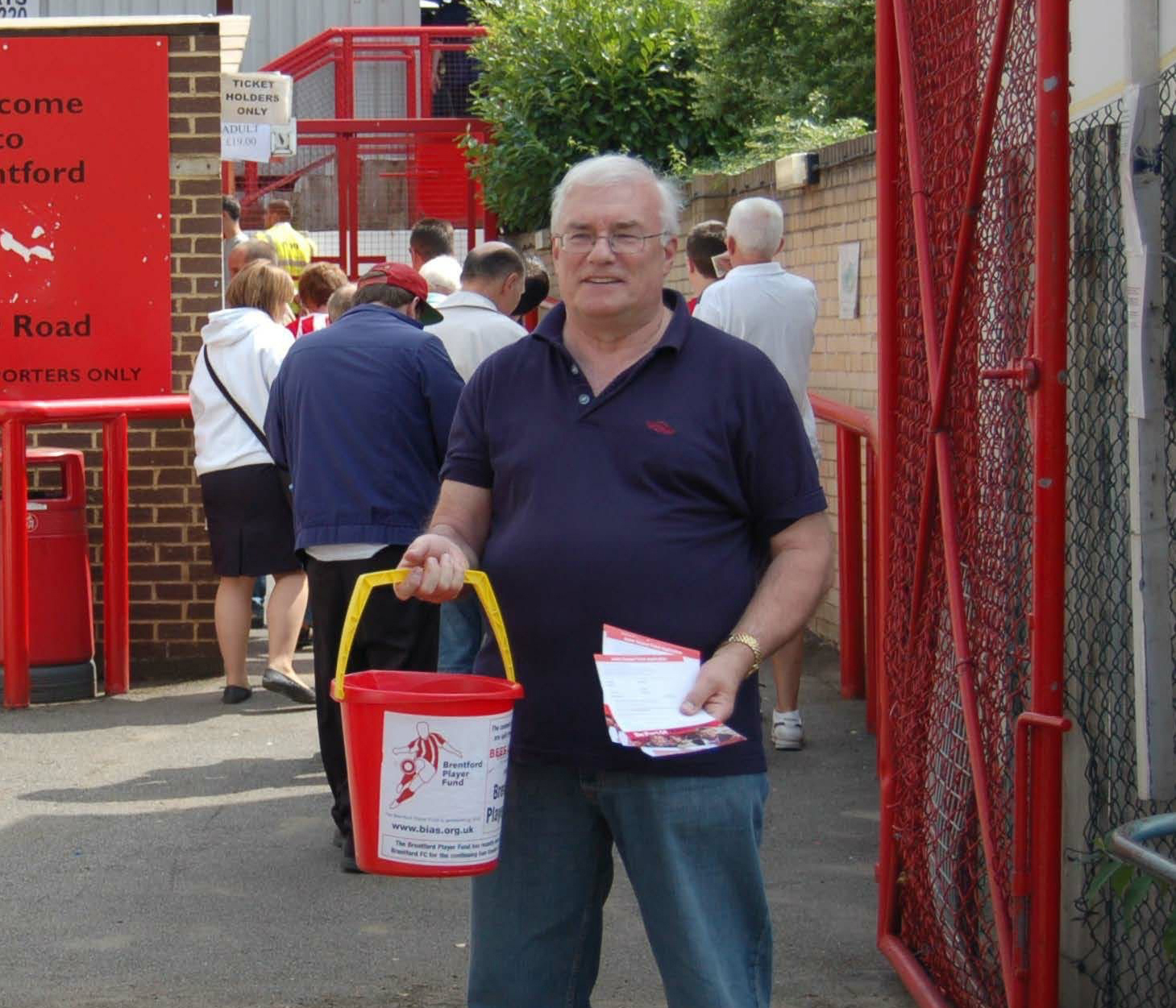 BU Director John Anderson collecting money for the Brentford Bees Community outside the Gtech Community Stadium